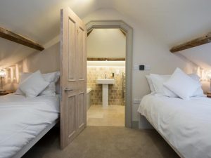 Cosy Twin Bedroom with Bathroom for Guests in a Cool Norfolk Holiday Home