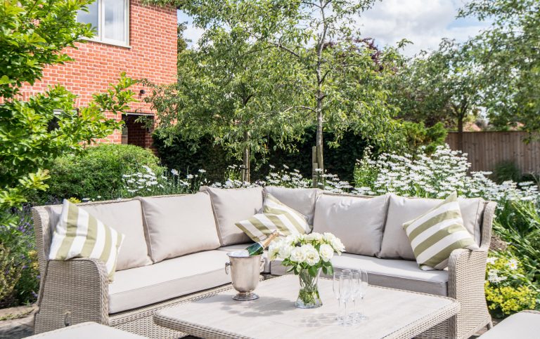 Intimate outdoor seating area with champagne for celebrations and parties in Norfolk